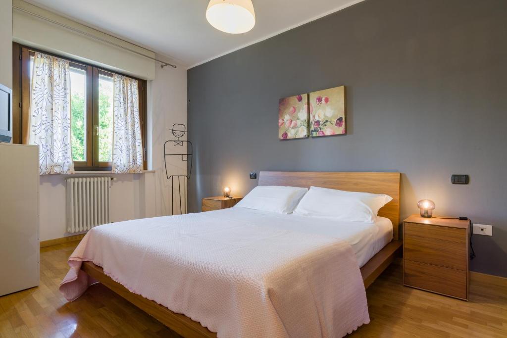Postel nebo postele na pokoji v ubytování Le Volpi in città