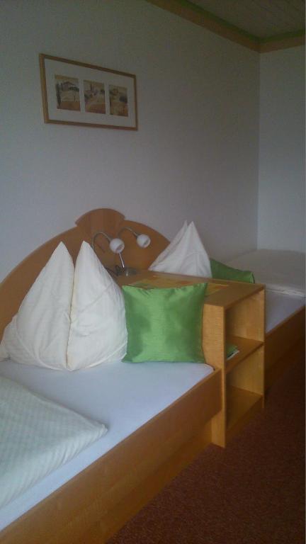 Postel nebo postele na pokoji v ubytování Pension Siegelbrunn B&B