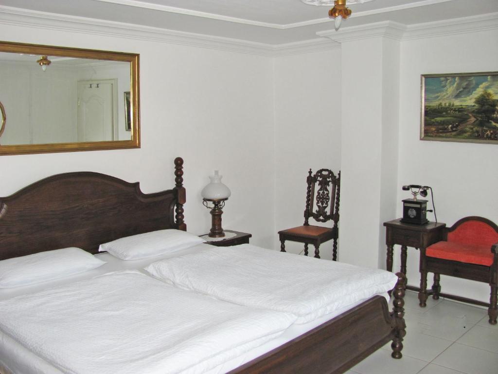 Postel nebo postele na pokoji v ubytování Apartment Storchenfärbe