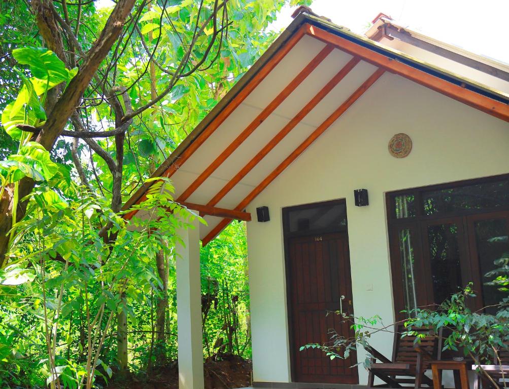 Zahrada ubytování Palmyra Nature Resort Sigiriya