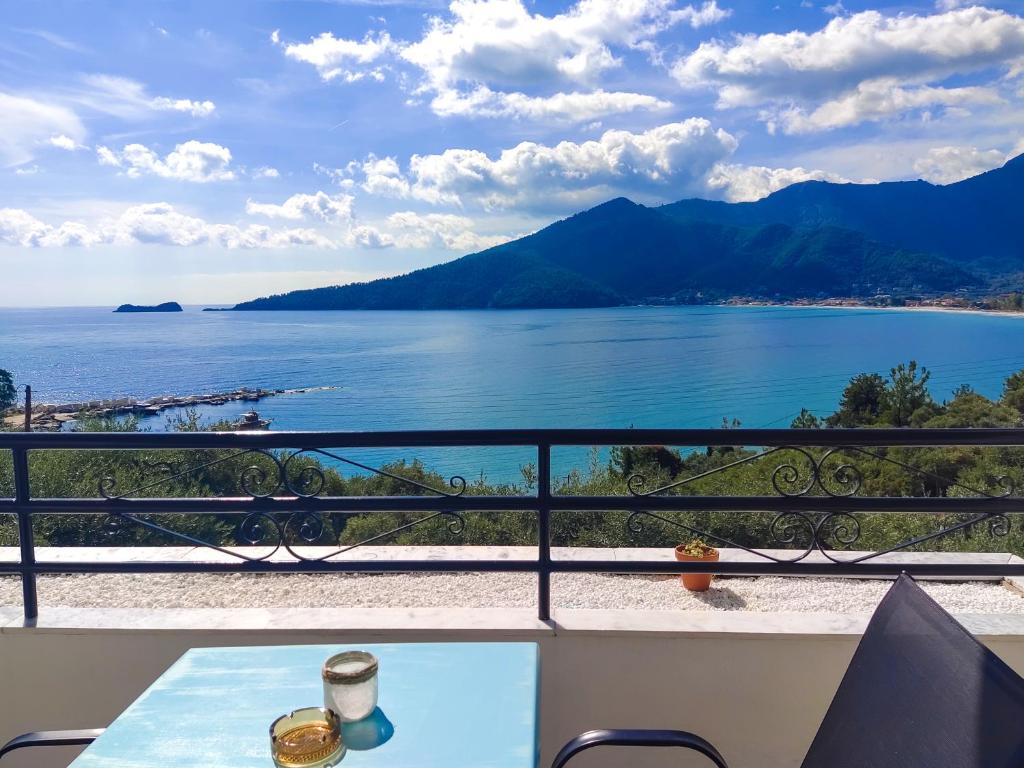 a view of the ocean from a balcony at Celeste Golden Beach in Chrysi Ammoudia