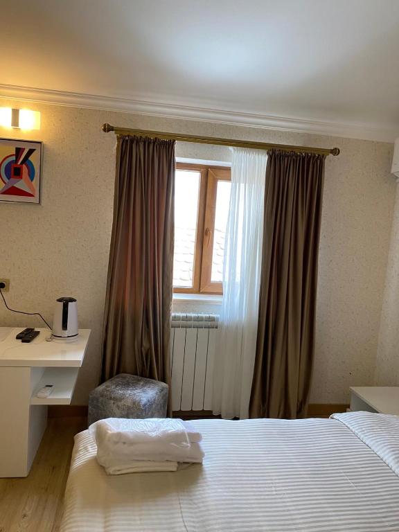 Postel nebo postele na pokoji v ubytování Hotel 12 Tve