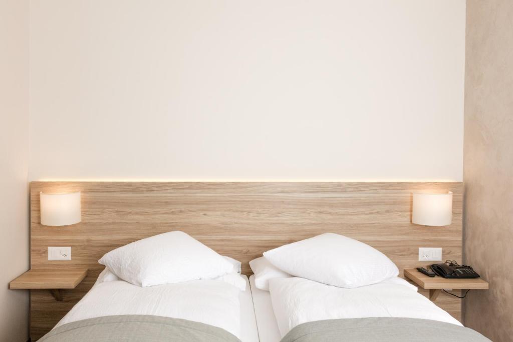 Letto o letti in una camera di Hôtel de Chailly