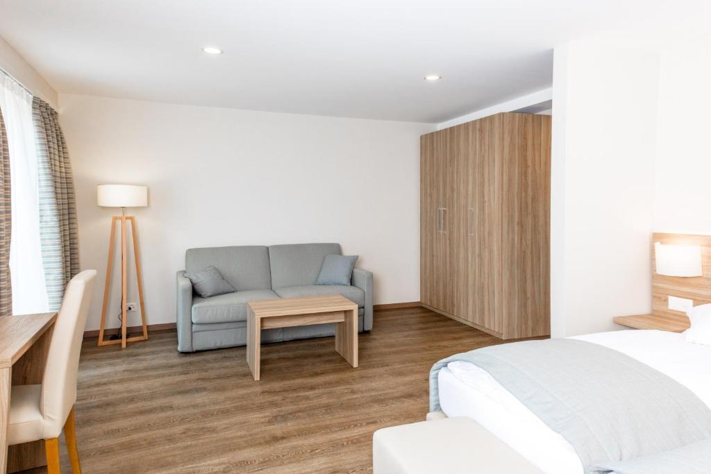 Letto o letti in una camera di Hôtel de Chailly