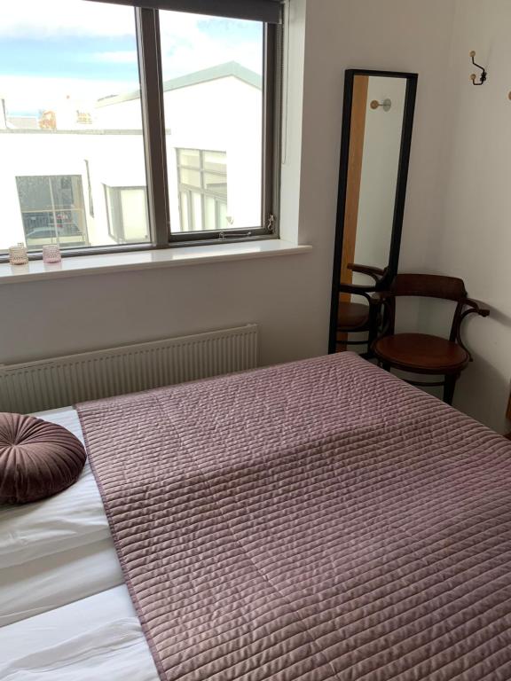 Postel nebo postele na pokoji v ubytování Mengi Apartments