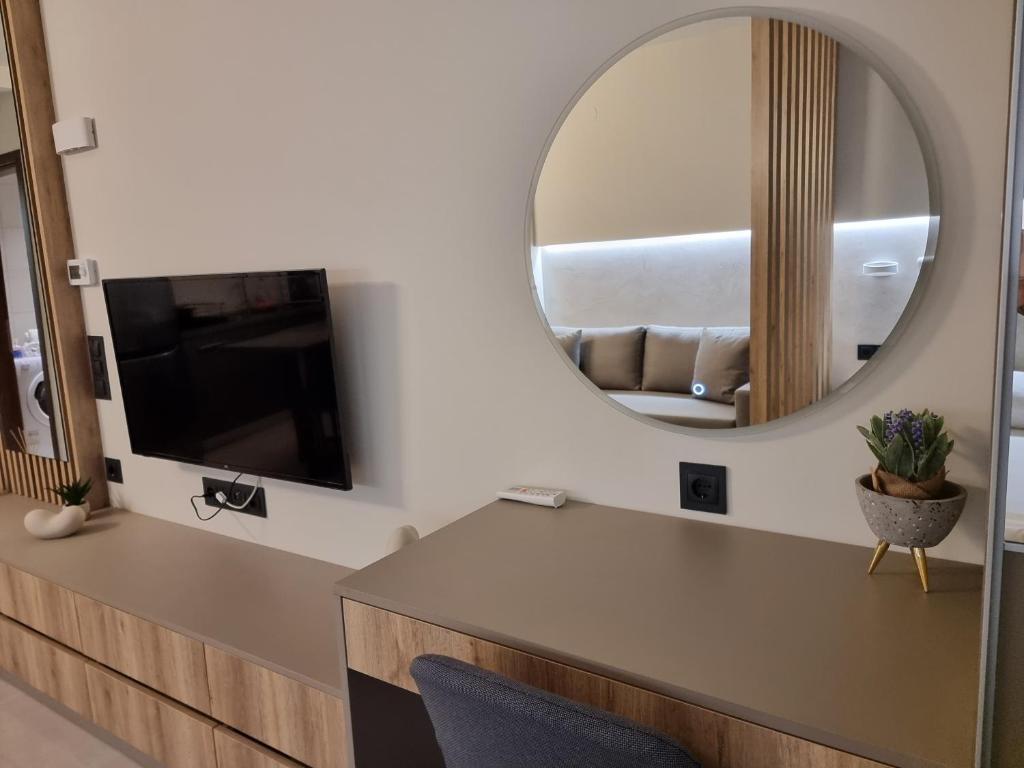 Telewizja i/lub zestaw kina domowego w obiekcie Iris City Center Premium Studio