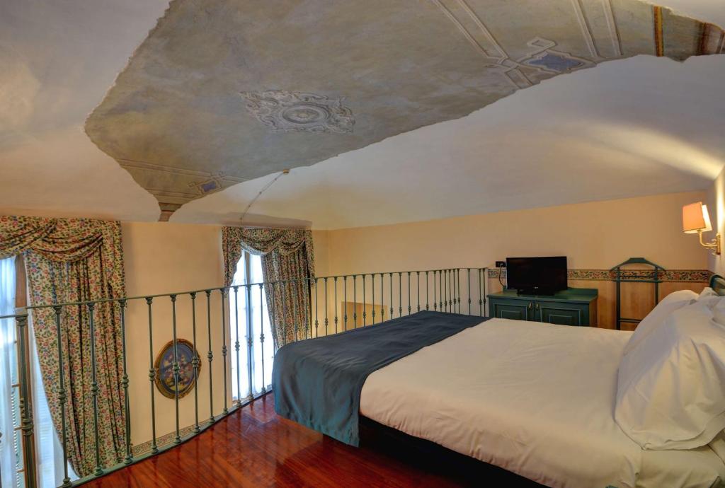 Postel nebo postele na pokoji v ubytování Best Western Hotel Genio
