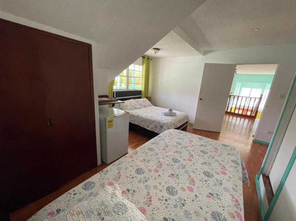 Cama ou camas em um quarto em Villa Sunny Days