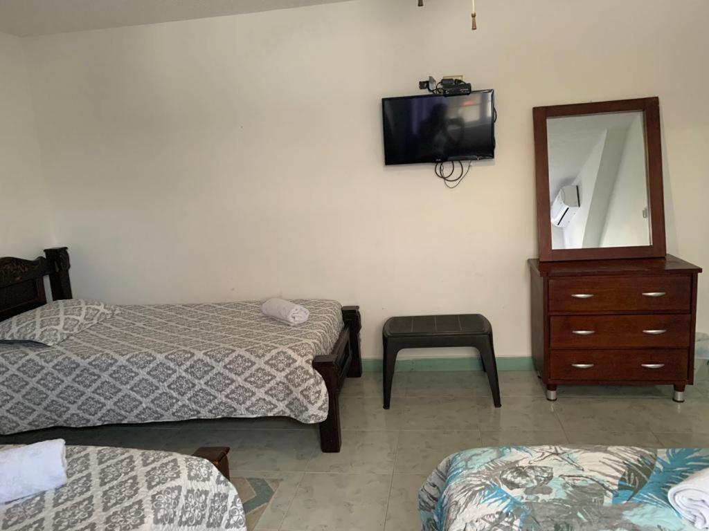 Cama ou camas em um quarto em Villa Sunny Days