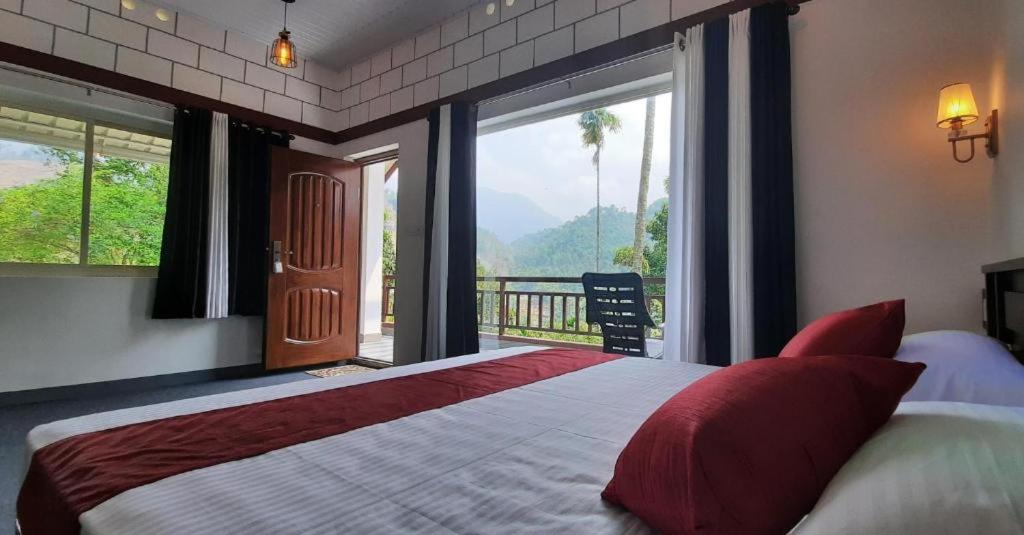 Säng eller sängar i ett rum på Linn View Home Stay Munnar