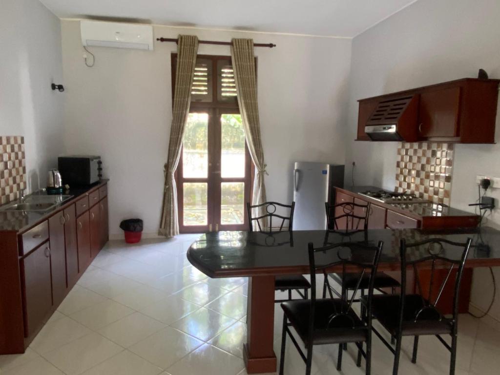 Kuchyň nebo kuchyňský kout v ubytování Christima Residence