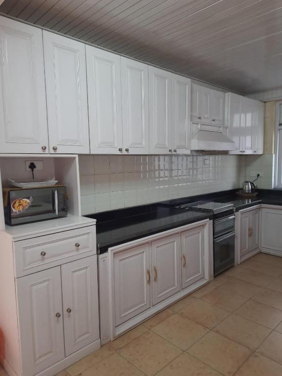 Kuchyň nebo kuchyňský kout v ubytování SEWANS PLACE Homestay