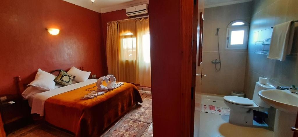 Postel nebo postele na pokoji v ubytování Hotel Marmar