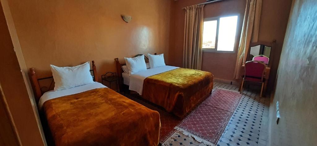 Postel nebo postele na pokoji v ubytování Hotel Marmar