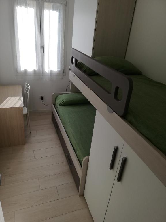 A bed or beds in a room at Nuovissimo appartamento con terrazza