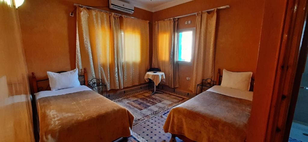 Postel nebo postele na pokoji v ubytování Hotel Marmar