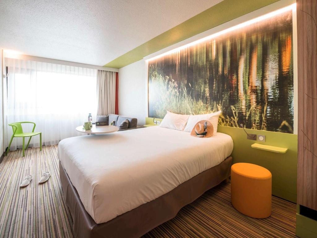 Postel nebo postele na pokoji v ubytování Ibis Styles Toulouse Labège