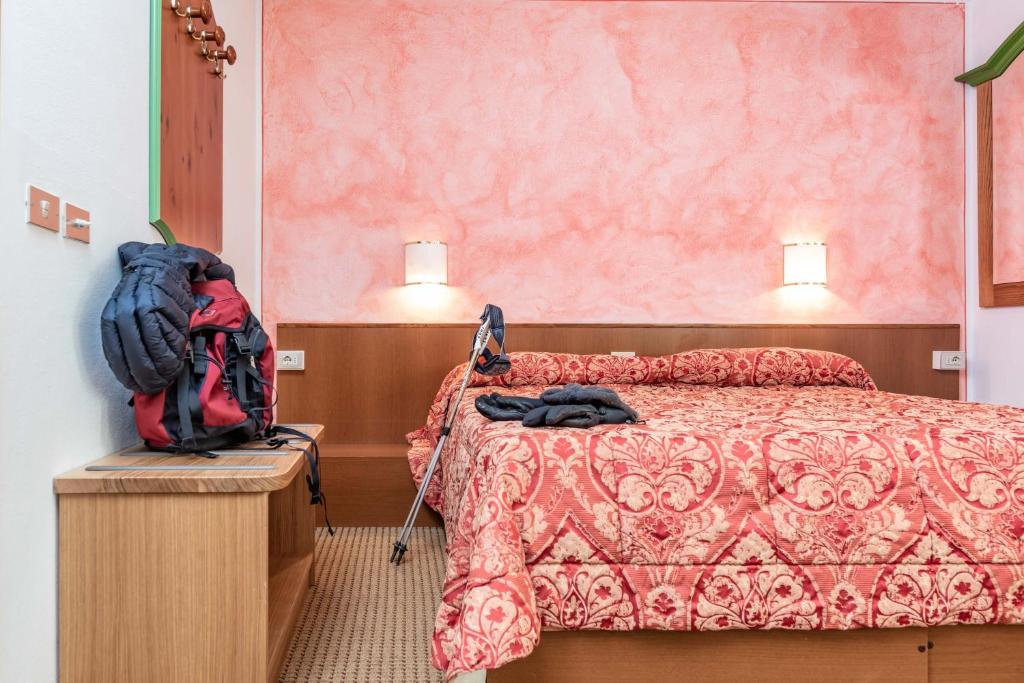 Postel nebo postele na pokoji v ubytování Hotel Italo
