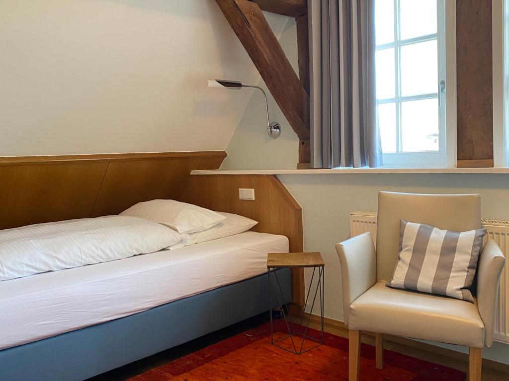 Postel nebo postele na pokoji v ubytování Hotel Weber