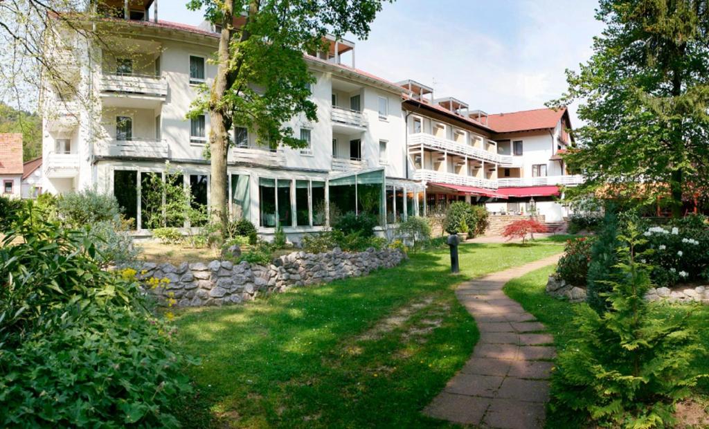 a view of the inn from the garden at Hotel Kurparkblick in Bad Bergzabern