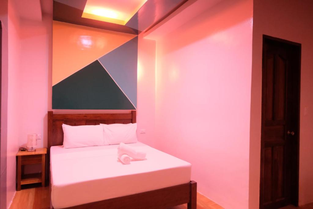 Postel nebo postele na pokoji v ubytování MANANQUIL TRAVEL LODGE