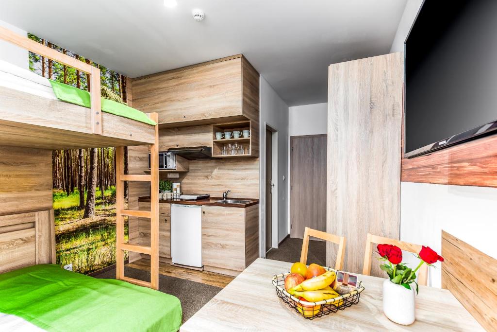 Kuchyň nebo kuchyňský kout v ubytování Hilson Jasna - Garden resort