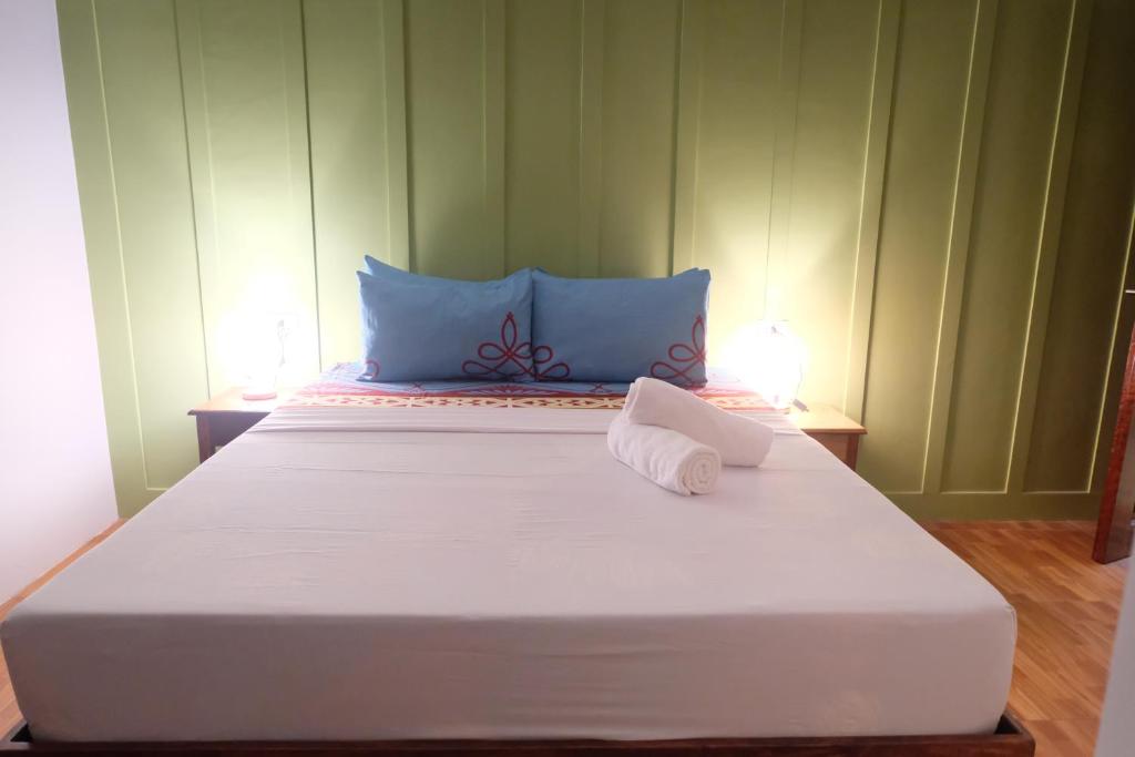 Postel nebo postele na pokoji v ubytování MANANQUIL TRAVEL LODGE
