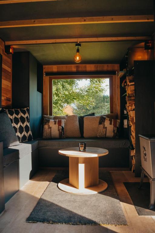 Area soggiorno di Tiny House Célestine By Ernesst