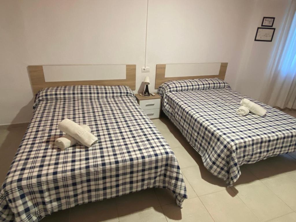 Postel nebo postele na pokoji v ubytování Arc House Ribera Only Adults