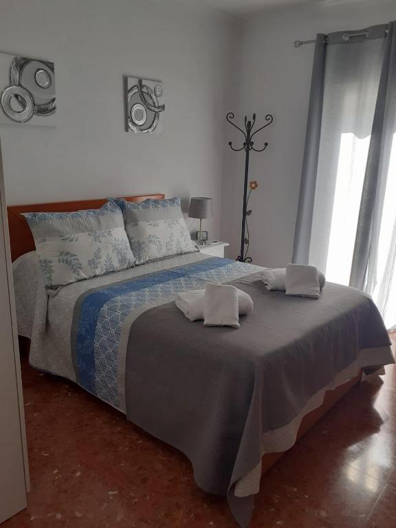 Postel nebo postele na pokoji v ubytování Casa Rural Plaza Zahara Buenas Vistas