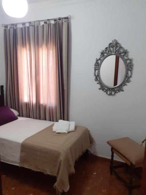 Postel nebo postele na pokoji v ubytování Casa Rural Plaza Zahara Buenas Vistas