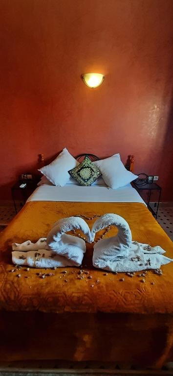 Postel nebo postele na pokoji v ubytování Hotel Marmar