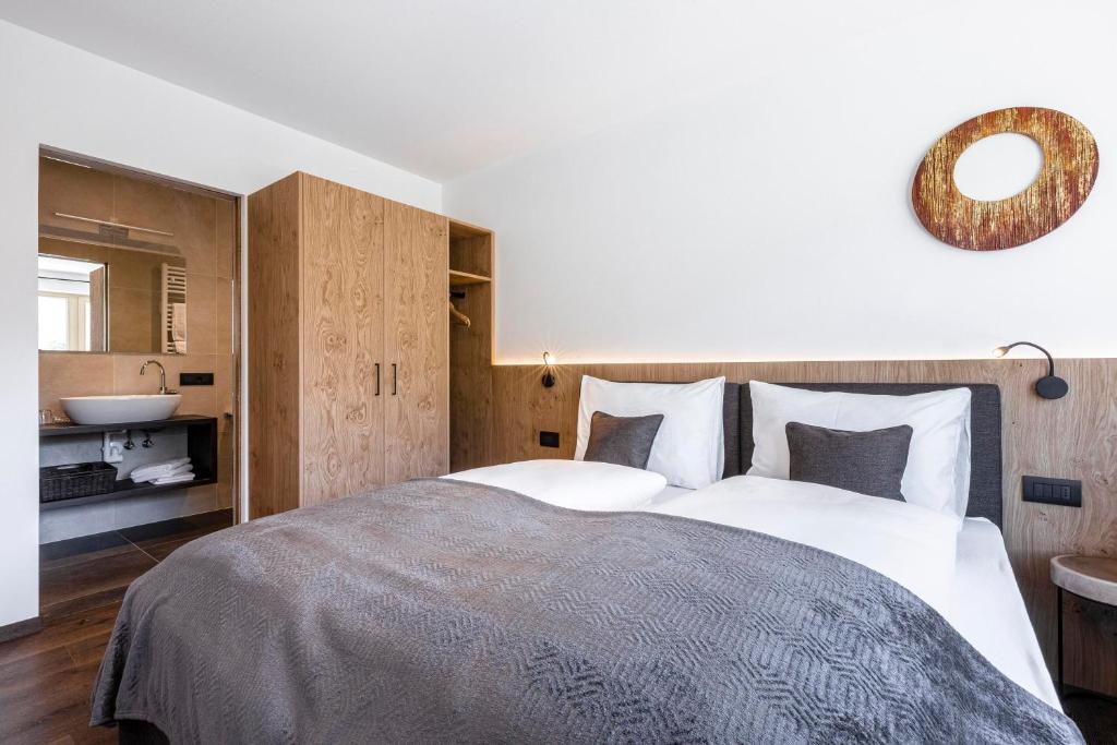 Posteľ alebo postele v izbe v ubytovaní Apartment Ravison