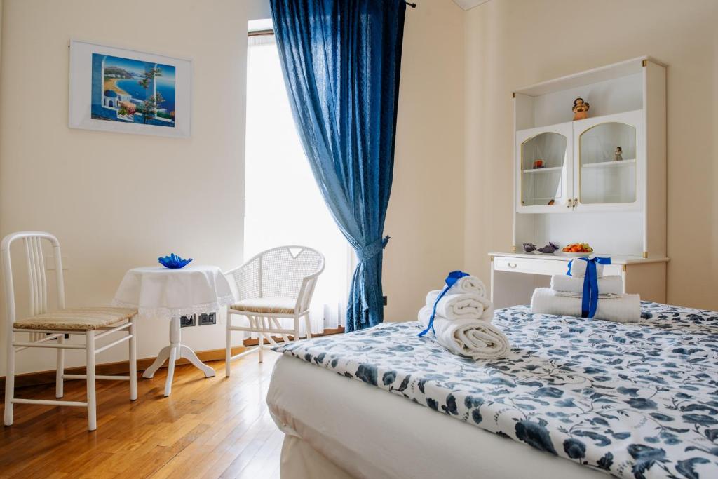 Postel nebo postele na pokoji v ubytování La Dolce Vita
