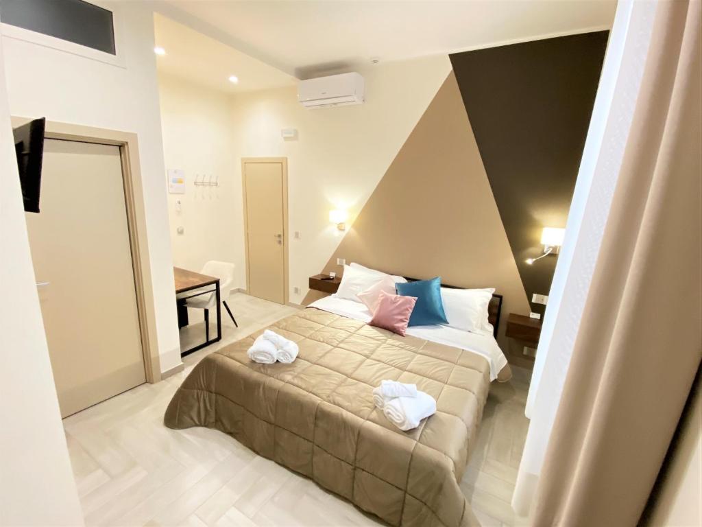 Posteľ alebo postele v izbe v ubytovaní B&B De Nava Suite