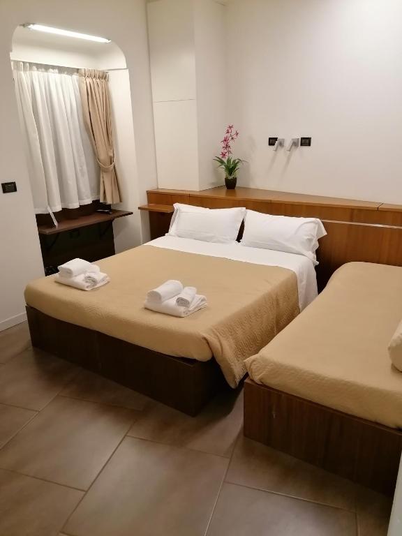 Postel nebo postele na pokoji v ubytování Accomodation Verona - City Centre