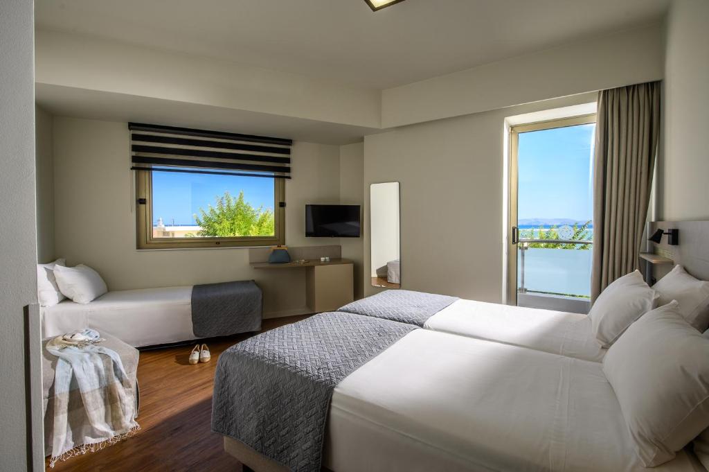 Postel nebo postele na pokoji v ubytování Marin Hotel