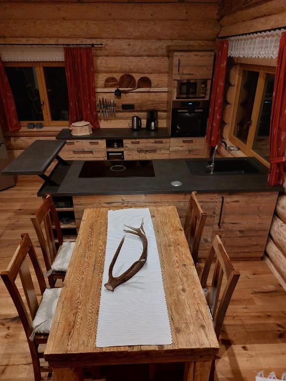 Köök või kööginurk majutusasutuses Ferienhaus - Chalet - Lechtraum