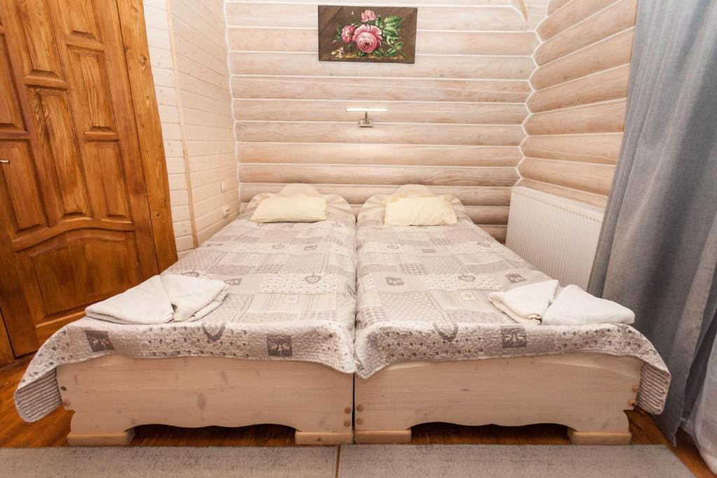 Postel nebo postele na pokoji v ubytování Guest house М