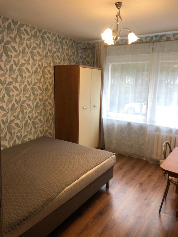 Łóżko lub łóżka w pokoju w obiekcie Apartament Gosia