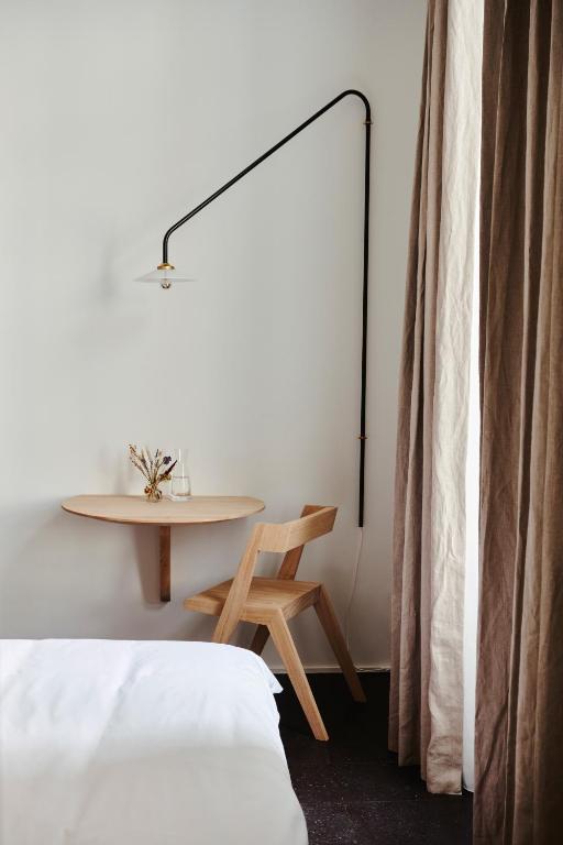 Postel nebo postele na pokoji v ubytování Edgar Guesthouse