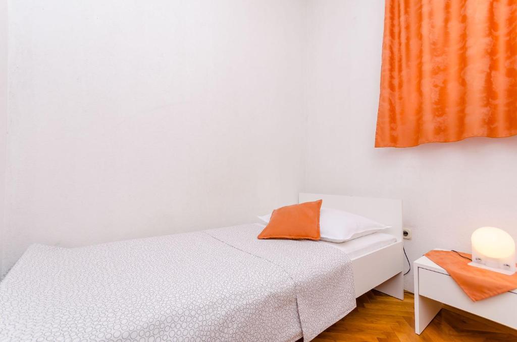 Posteľ alebo postele v izbe v ubytovaní Apartments Jurko