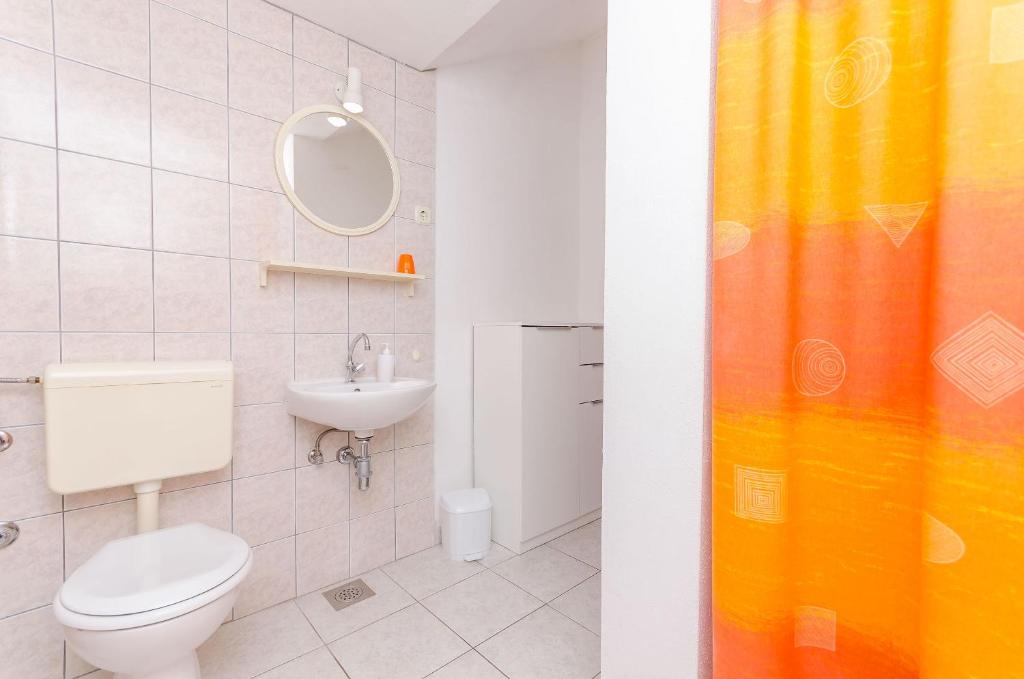Kúpeľňa v ubytovaní Apartments Jurko