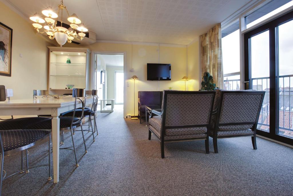 Televiisor ja/või meelelahutuskeskus majutusasutuses Radisson Blu Limfjord Hotel, Aalborg