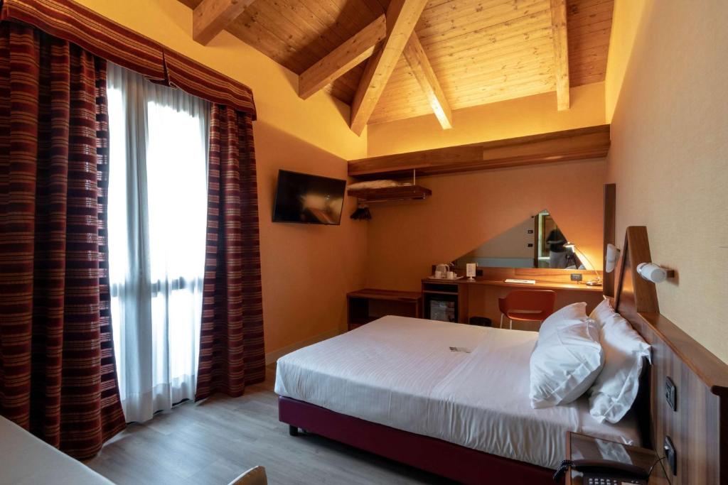Postel nebo postele na pokoji v ubytování La Villa - Sure Hotel Collection by Best Western