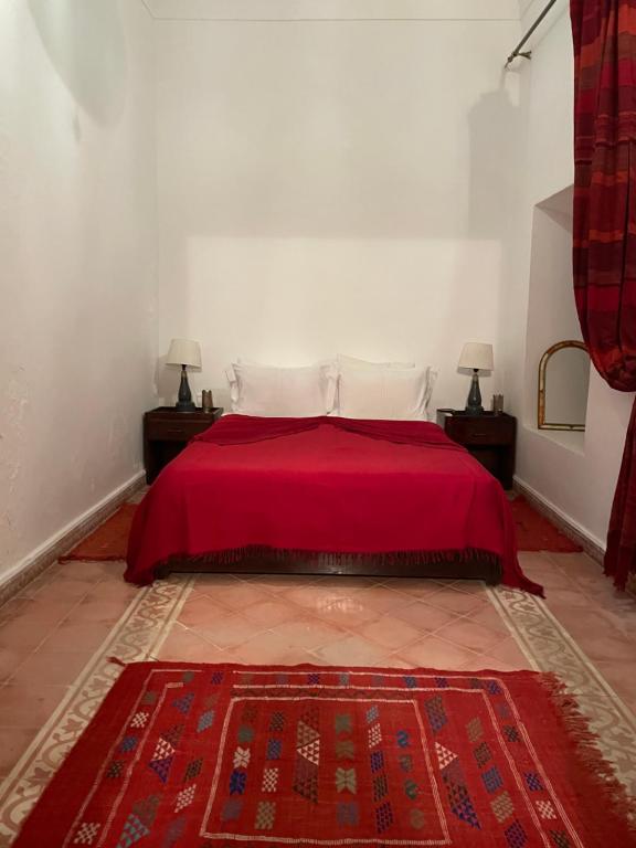 Postel nebo postele na pokoji v ubytování Riad Safia