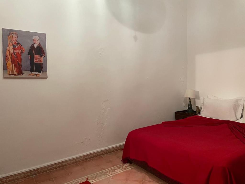 Postel nebo postele na pokoji v ubytování Riad Safia