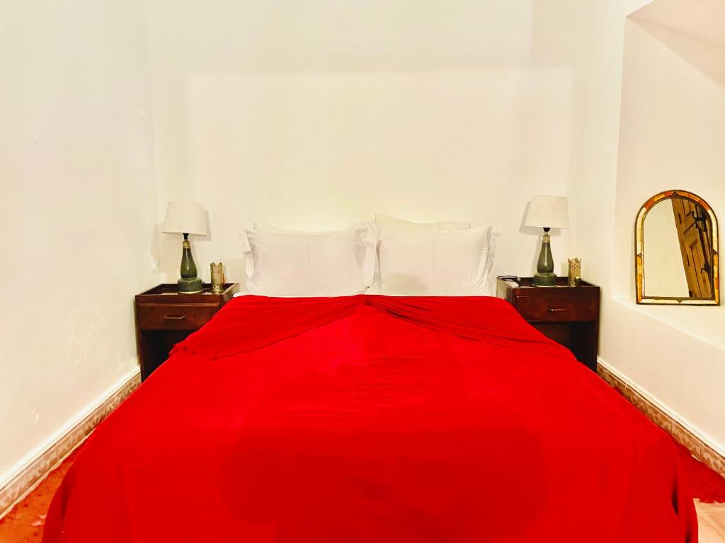 Postel nebo postele na pokoji v ubytování Riad Safia