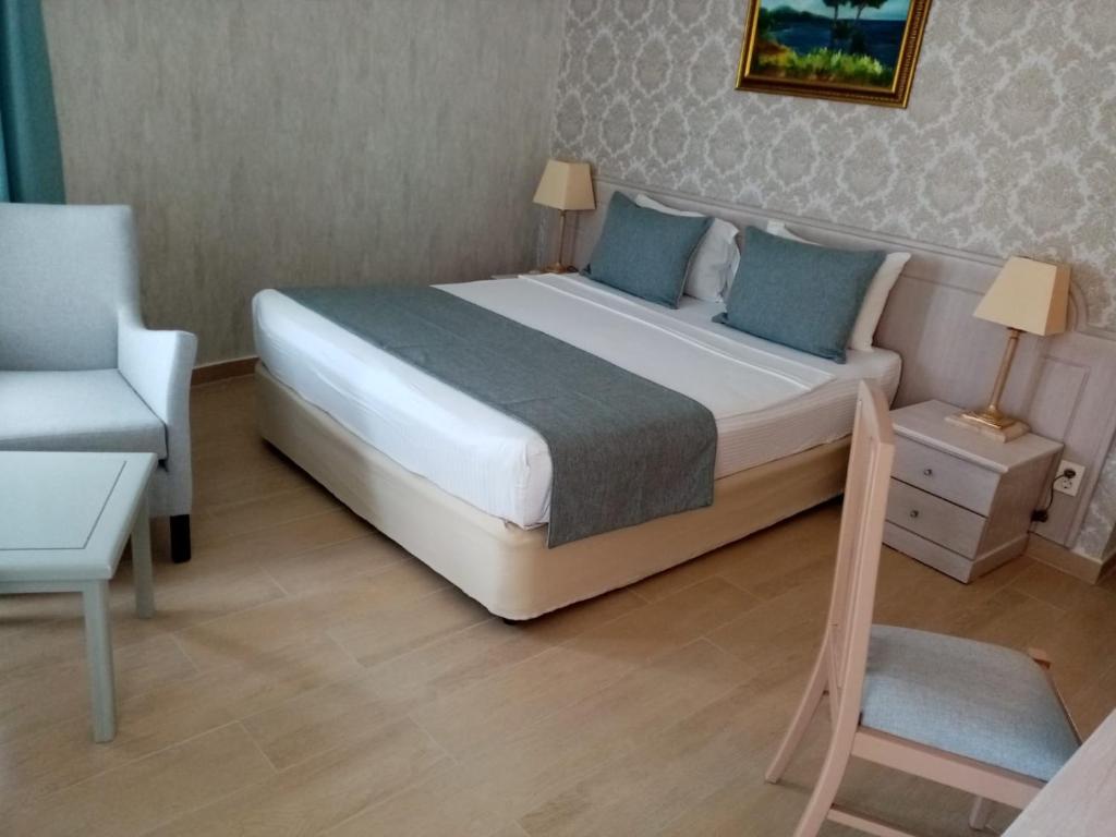 Postel nebo postele na pokoji v ubytování X Life Hotel Sarıgerme 15 - Adult Hotel