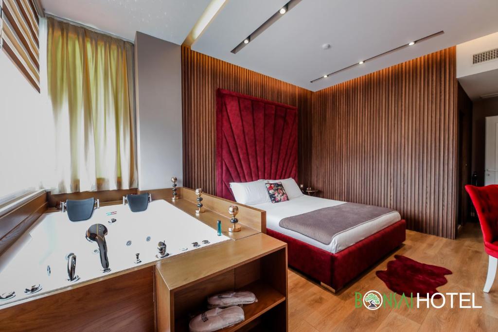 Postel nebo postele na pokoji v ubytování Hotel Bonsai